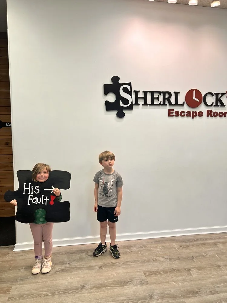 Sherlock's Escape Rooms logo