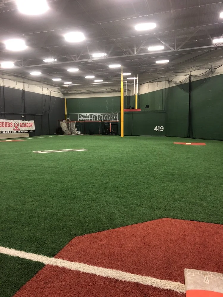 Sluggers Academy logo