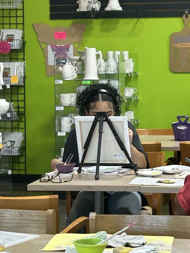 Paint n Brush The Creativity Cafe logo