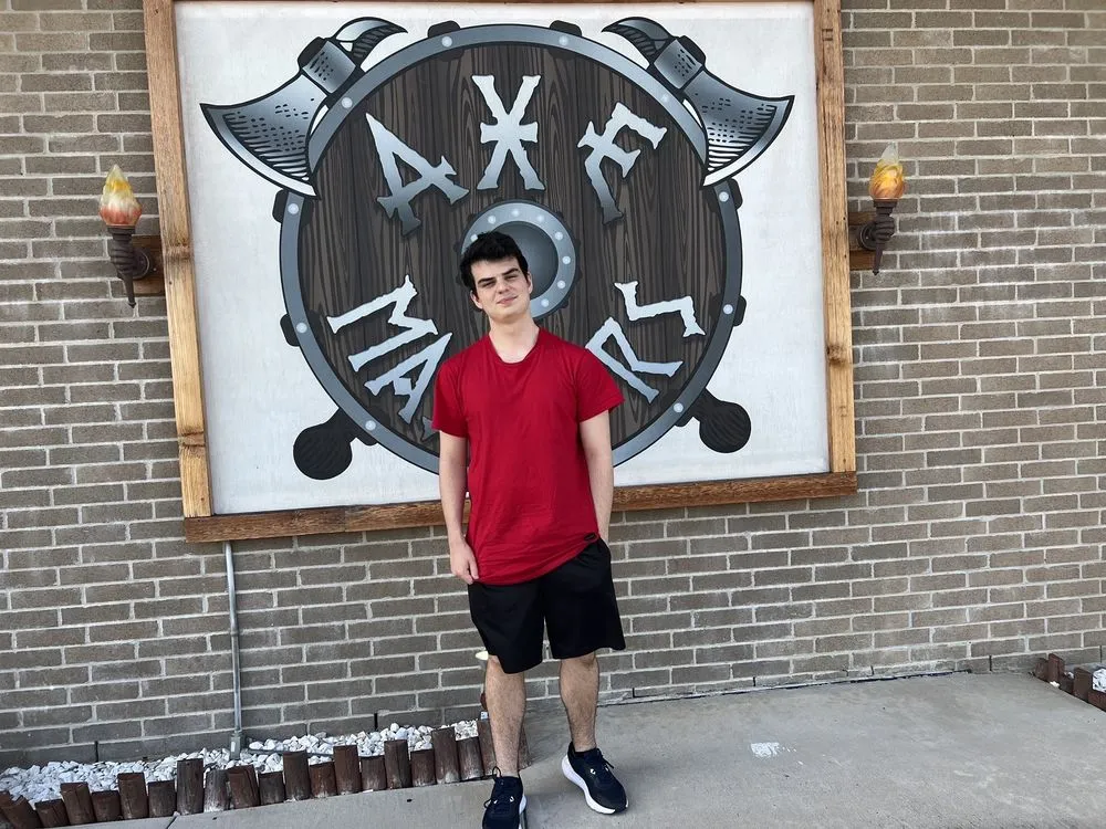 Axe Masters Texas - Axe Throwing Arena and Game Den logo