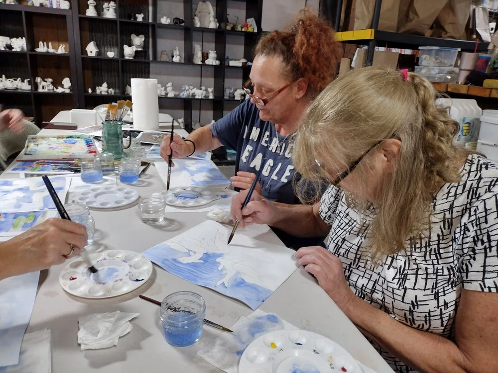Explore Art and Clay logo
