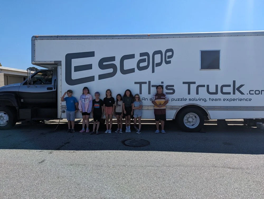 Escape This Truck logo