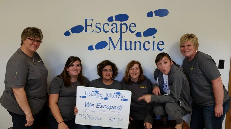 Escape Muncie logo