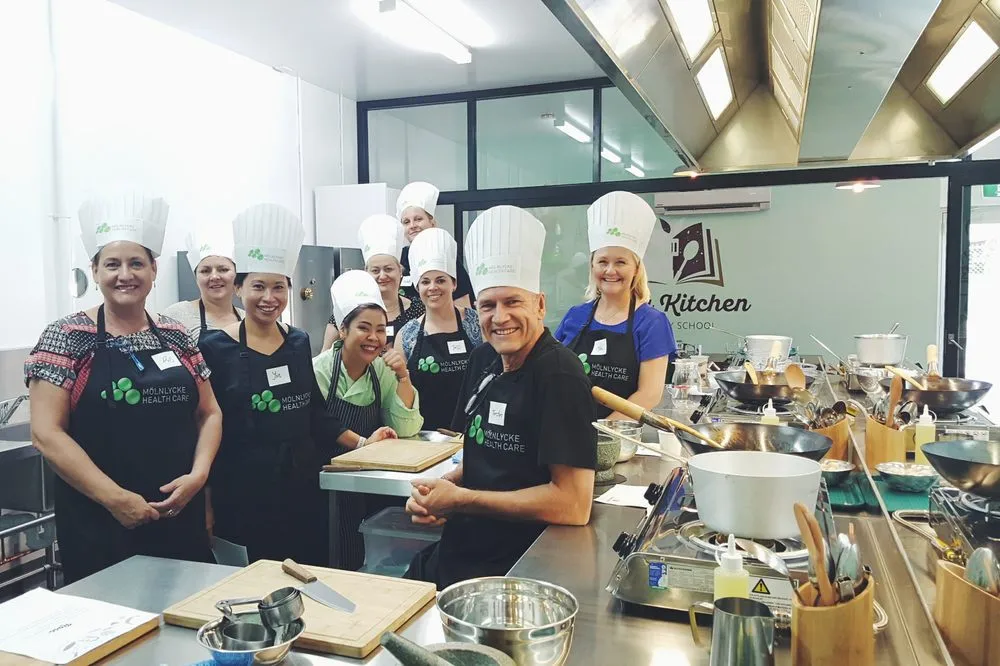 Taya Kitchen Culinary School logo